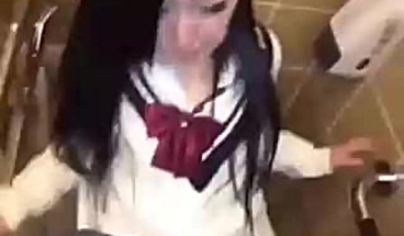 Chinese slut in schoolgirl outfit gets creampied on toilet